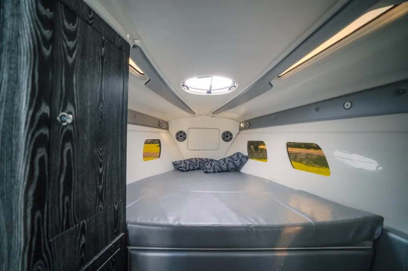 Slide: The Image of Interior of 2020 Concept 44' Cuddy Cabin with modern design and cozy bedding. - 32