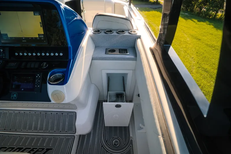 Slide: The Image of 2020 Concept 44' Cuddy Cabin boat interior with navigation system and storage compartment. - 43
