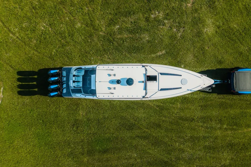Slide: The Image of Aerial view of 2020 Concept 44' Cuddy Cabin boat on grass, showcasing sleek design. - 12