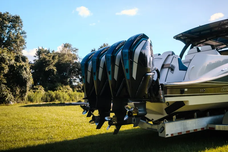 Slide: The Image of 2020 Concept 44' Cuddy Cabin boat with four powerful outboard engines on a trailer. - 18