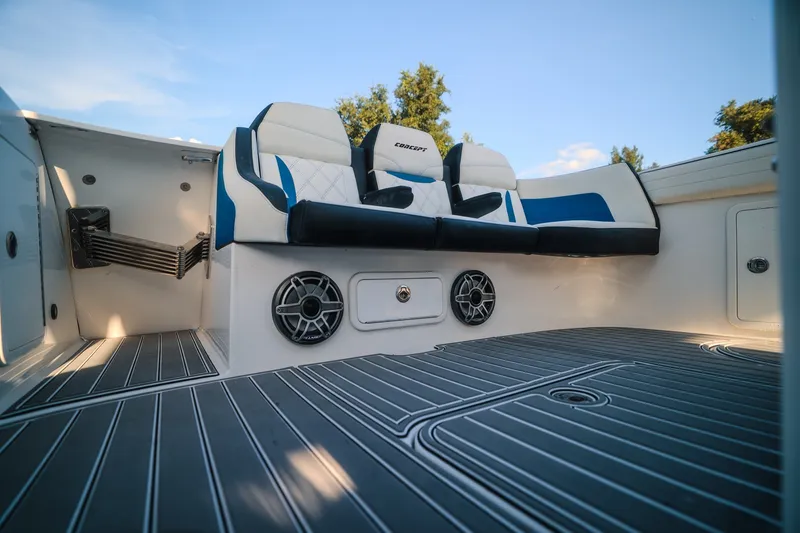 Slide: The Image of 2020 Concept 44' Cuddy Cabin boat interior with cushioned seating and sleek flooring. - 61