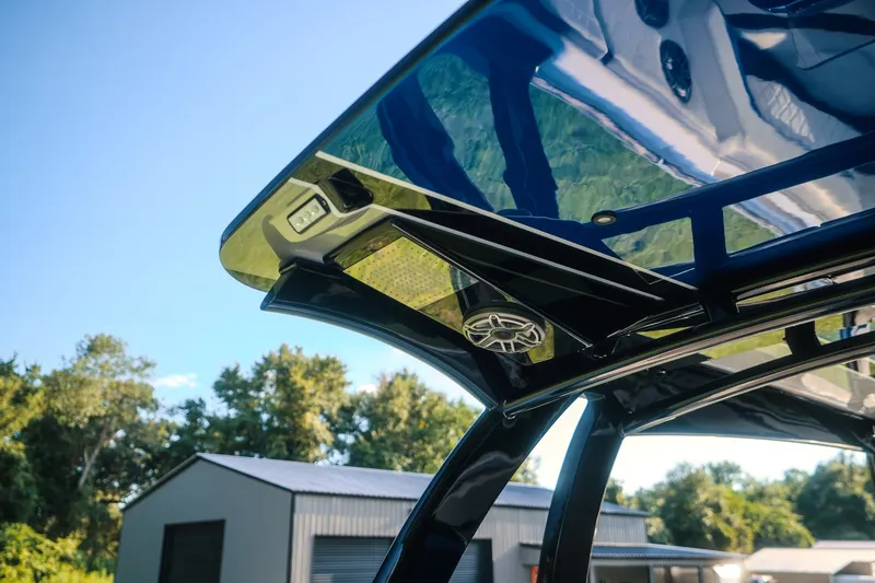 Slide: The Image of Sleek 2020 Concept 44' Cuddy Cabin boat roof with speaker, outdoors. - 50