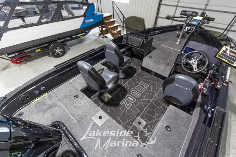 Slide: The Image of Interior of 2027 Recon 985 DC boat at Lakeside Marina showroom. - 14