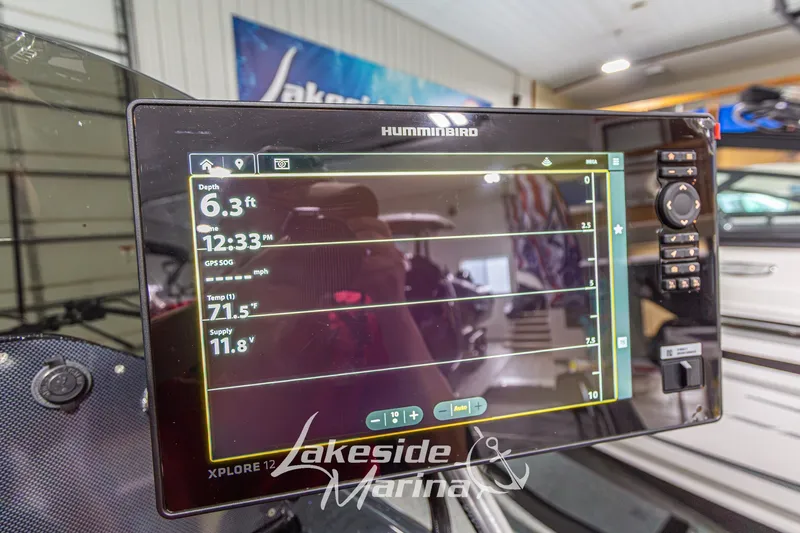 Slide: The Image of Humminbird fish finder display on Recon 985 DC, showing depth and temperature readings. - 21