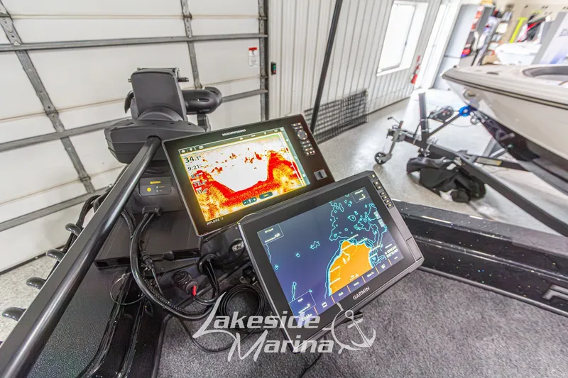 Slide: The Image of Fishfinder and navigation screens on a 2027 Recon 985 DC boat at Lakeside Marina. - 30