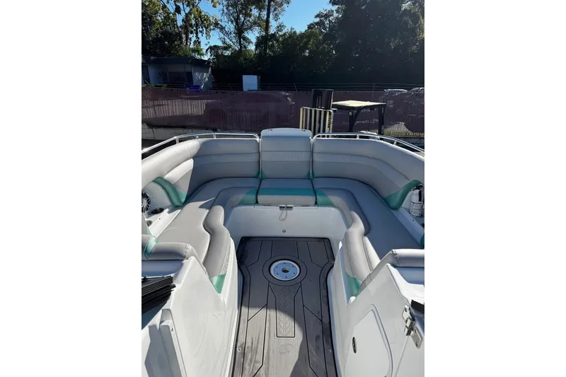 Slide: The Image of 2024 Hurricane SunDeck 2486 OB boat interior with spacious seating and modern design. - 5