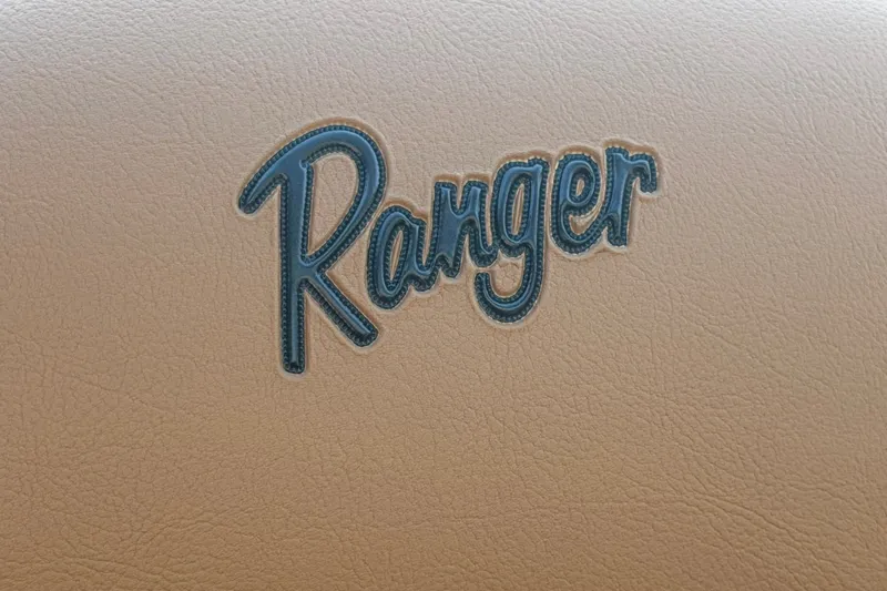 Slide: The Image of Ranger logo on beige leather, 2027 Ranger 220FC model. - 25