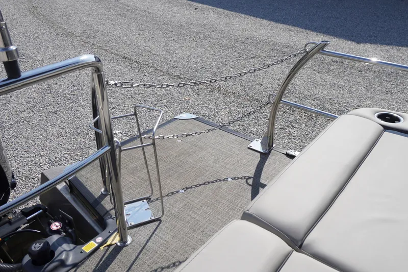 Slide: The Image of 2024 Barletta Cabrio 22UC boat deck with seating and safety chains. - 44