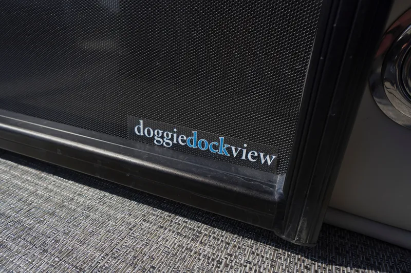 Slide: The Image of Doggie dock view feature on 2024 Barletta Cabrio 22UC boat. - 27