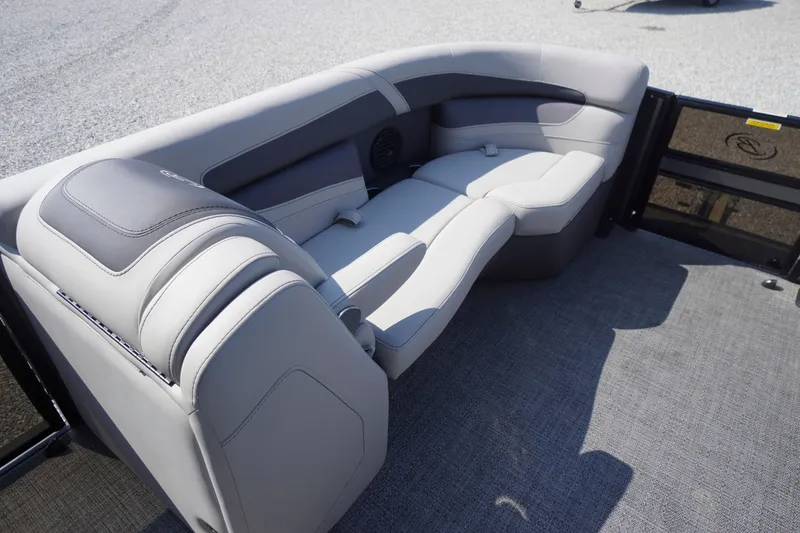 Slide: The Image of 2024 Barletta Cabrio 22UC boat interior with luxurious gray seating and carpeted flooring. - 8