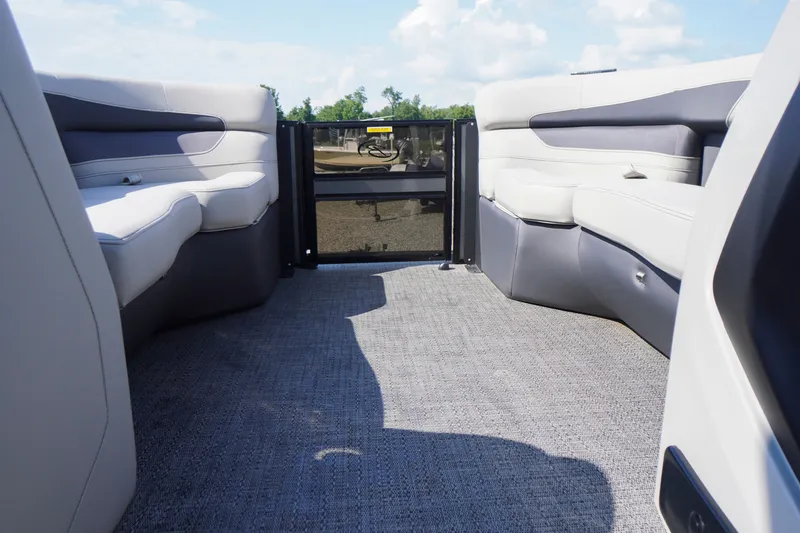Slide: The Image of 2024 Barletta Cabrio 22UC interior with plush seating and spacious layout. - 13
