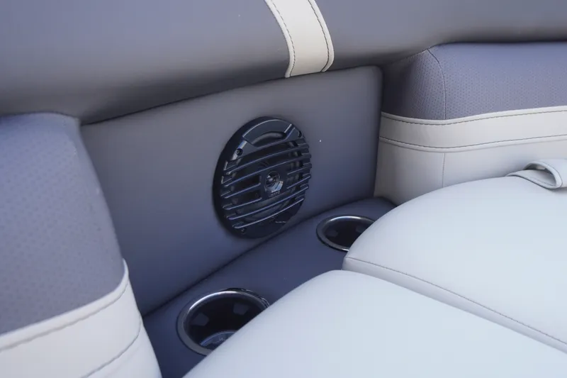 Slide: The Image of 2024 Barletta Cabrio 22UC interior with speaker and cup holders. - 12