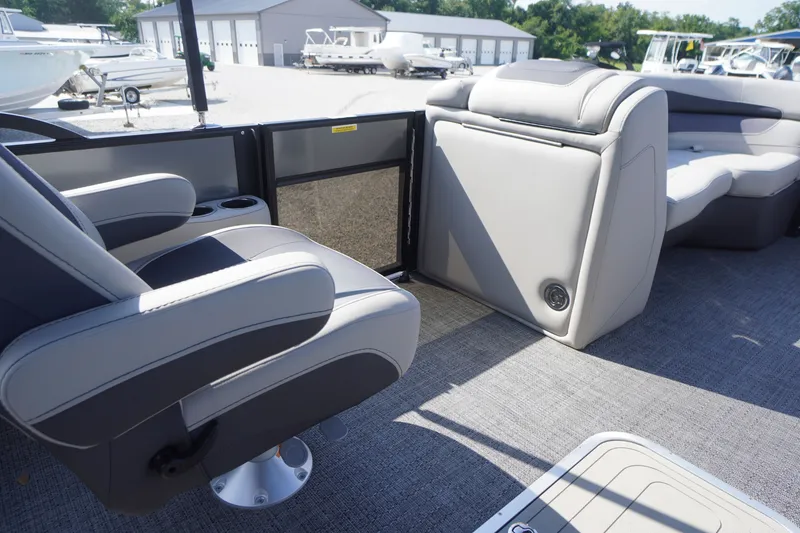 Slide: The Image of 2024 Barletta Cabrio 22UC boat interior with plush seating and modern design. - 23