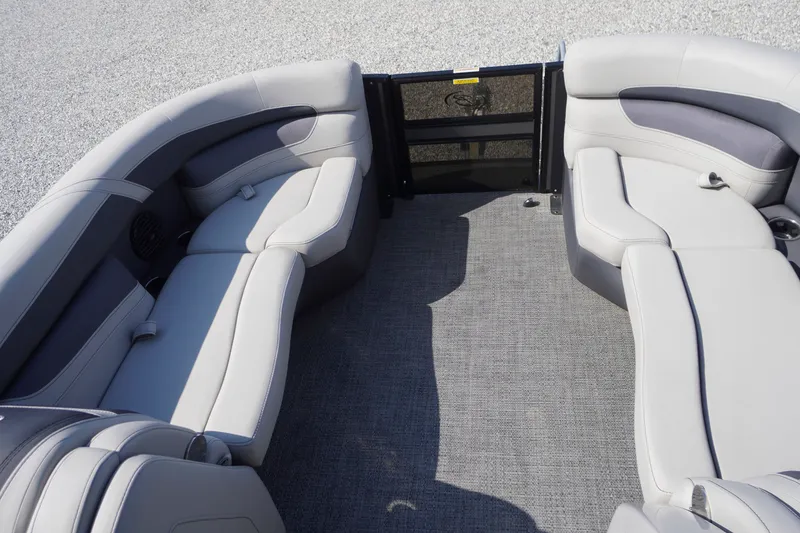 Slide: The Image of 2024 Barletta Cabrio 22UC boat interior with plush seating and modern design. - 6