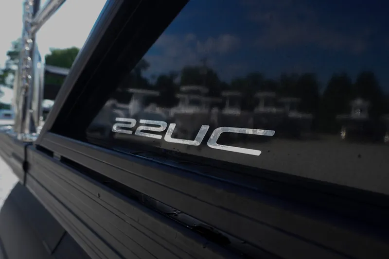 Slide: The Image of 2024 Barletta Cabrio 22UC logo on sleek boat exterior. - 3