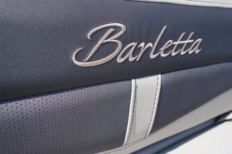 Slide: The Image of Close-up of Barletta logo on 2024 Cabrio 22UC boat upholstery. - 41