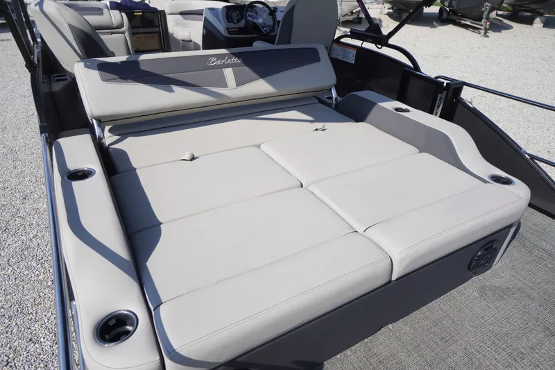Slide: The Image of 2024 Barletta Cabrio 22UC boat interior with spacious seating and cup holders. - 38