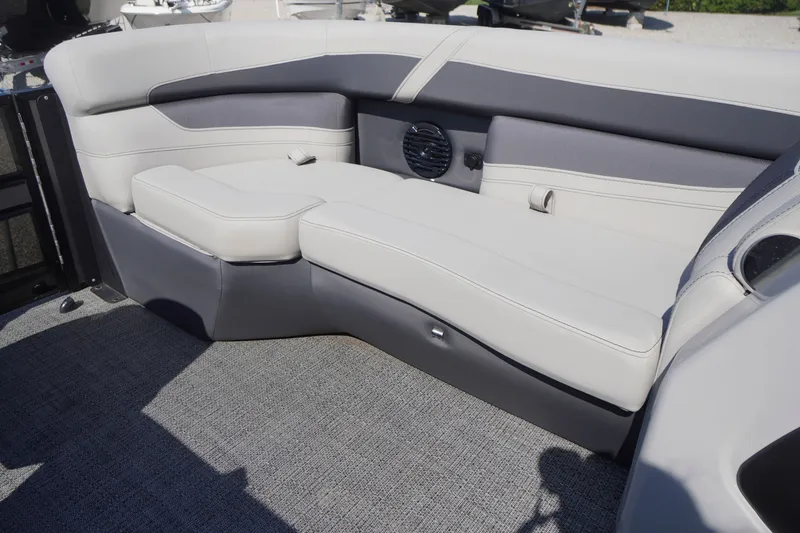 Slide: The Image of 2024 Barletta Cabrio 22UC boat interior with plush seating and modern design. - 11