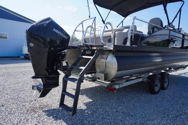 Slide: The Image of 2024 Barletta Cabrio 22UC pontoon boat with Mercury engine on trailer. - 50