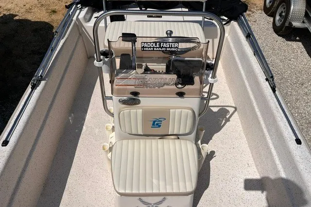 Slide: The Image of 2018 Carolina Skiff 16 JVX CC boat interior with console and seating. - 10