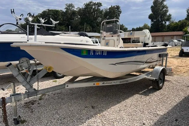 The Image of 2018 Carolina Skiff 16 JVX CC boat on trailer, parked outdoors. - 0