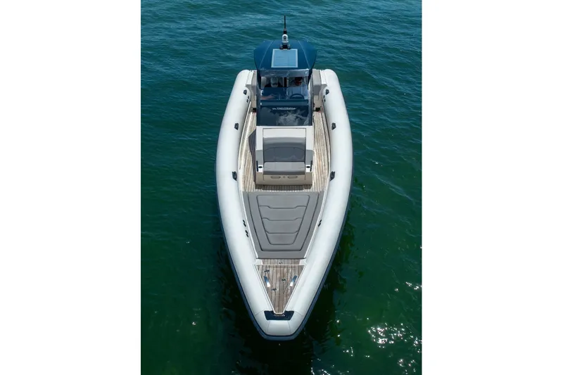 Slide: The Image of 2021 Technohull 38 Grand Sport boat on calm water, aerial view. - 6