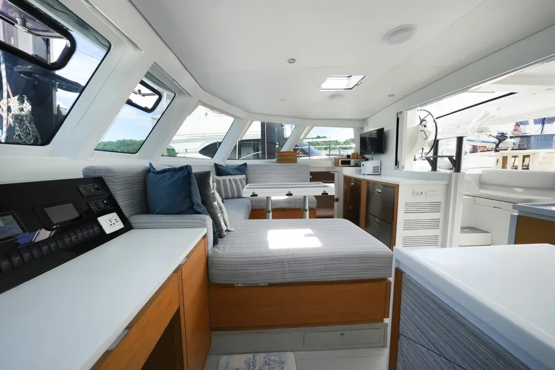 Slide: The Image of Luxurious interior of 2022 Balance 482 yacht with modern seating and panoramic windows. - 34