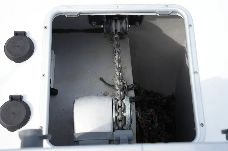Slide: The Image of Anchor chain compartment on a 2022 Balance 482 boat, featuring secure storage. - 65