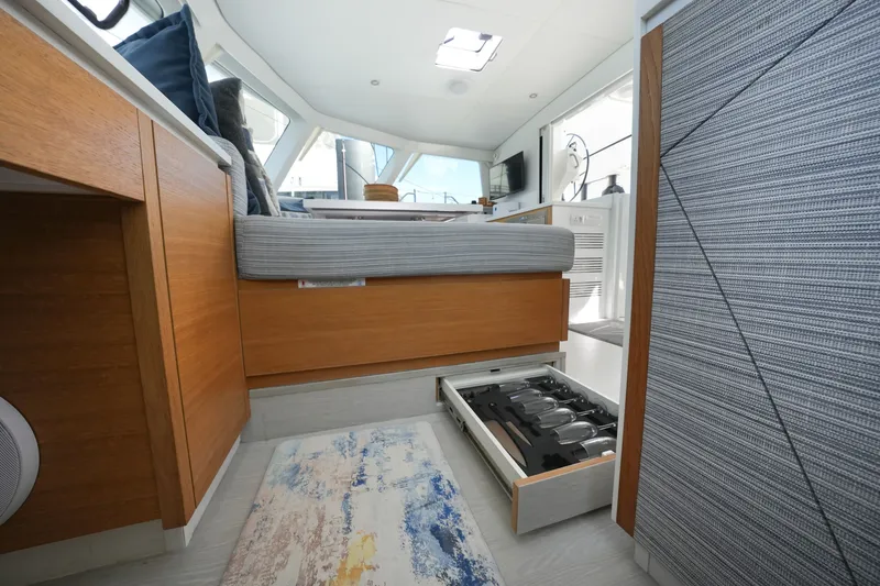 Slide: The Image of Interior of 2022 Balance 482 yacht with modern design and glass storage drawer. - 36