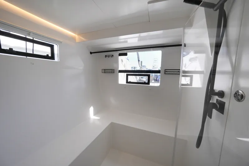 Slide: The Image of Modern interior of 2022 Balance 482 yacht, featuring sleek white design and ample natural light. - 54