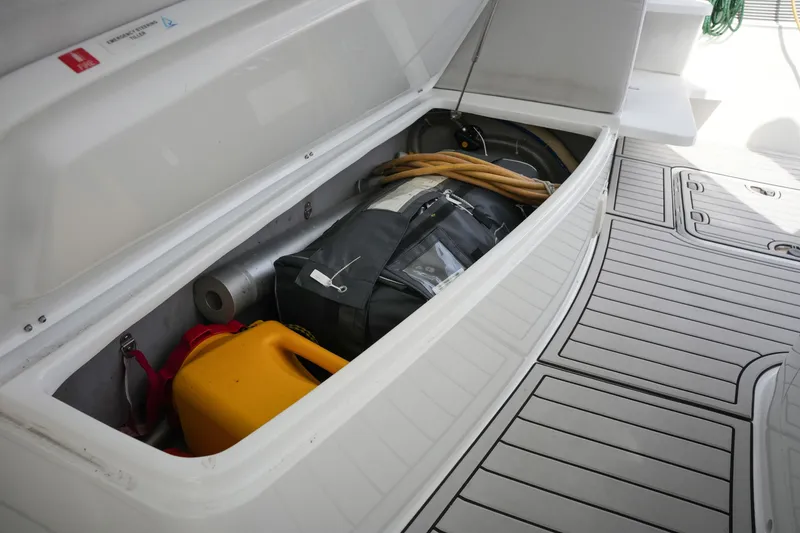 Slide: The Image of Open storage compartment on Balance 482 yacht, containing equipment and supplies, 2022 model. - 74