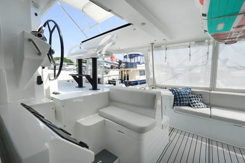 Slide: The Image of Modern 2022 Balance 482 yacht interior with helm, seating, and nautical decor. - 16