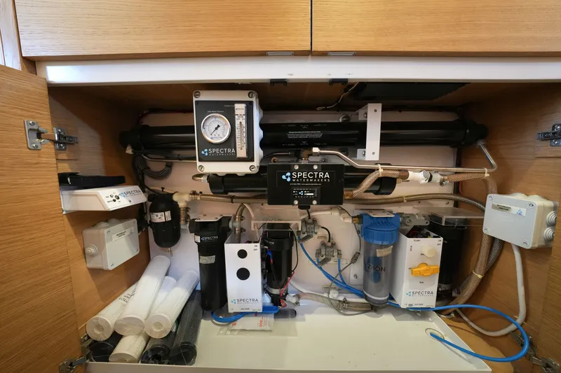 Slide: The Image of Water filtration system in a Balance 482 model, 2022, featuring Spectra Watermakers equipment. - 42
