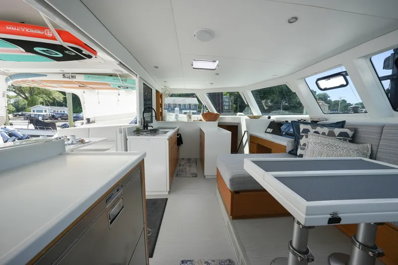 Slide: The Image of Modern interior of 2022 Balance 482 catamaran with sleek kitchen and comfortable seating area. - 25