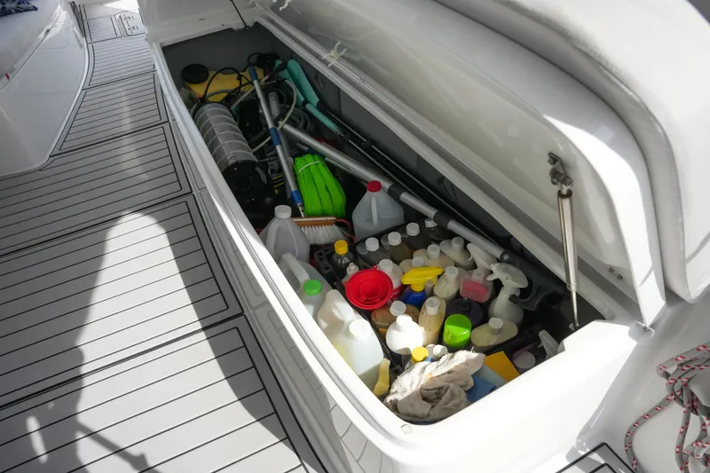 Slide: The Image of Storage compartment on Balance 482 yacht filled with cleaning supplies and tools, 2022 model. - 73