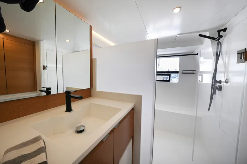 Slide: The Image of Modern bathroom interior on Balance 482 yacht, featuring sleek fixtures and minimalist design, 2022 model. - 52