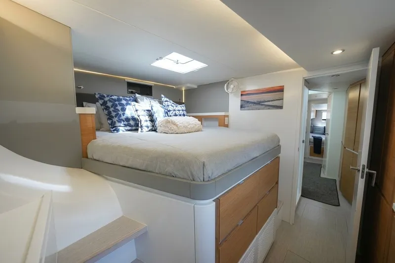 Slide: The Image of Modern bedroom interior in a 2022 Balance 482 yacht, featuring a cozy bed and stylish decor. - 58
