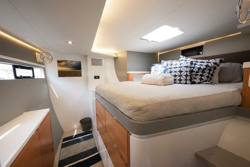 Slide: The Image of Luxurious cabin interior of 2022 Balance 482 yacht with cozy bed and modern decor. - 59