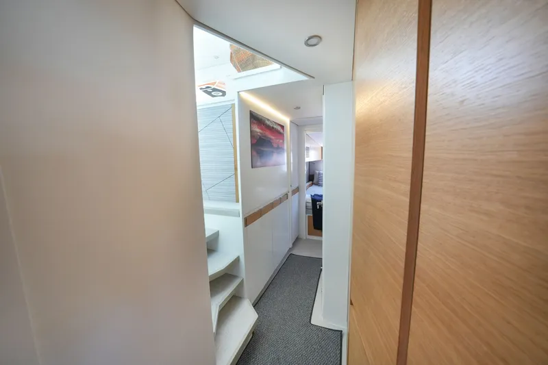 Slide: The Image of Modern interior hallway of Balance 482 yacht, featuring sleek design and wooden accents, 2022 model. - 55