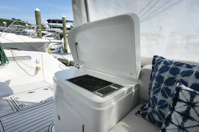 Slide: The Image of Outdoor yacht kitchen with grill on 2022 Balance 482 model, featuring nautical decor. - 22