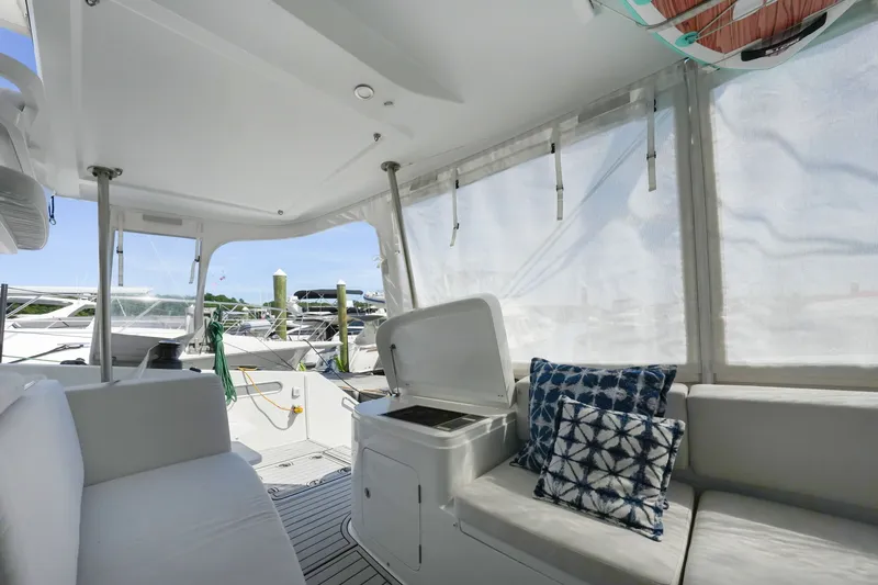 Slide: The Image of Interior of 2022 Balance 482 yacht with comfortable seating and decorative pillows. - 23