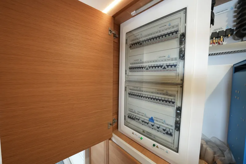 Slide: The Image of Electrical panel inside a wooden cabinet, Balance model 482, year 2022. - 41