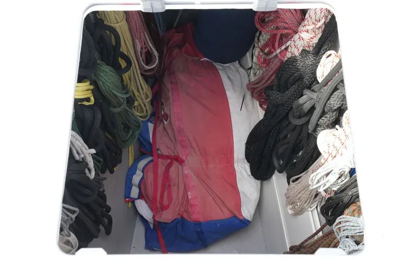 Slide: The Image of Storage compartment with colorful ropes and a pink sail bag, Balance 482, 2022 model. - 76