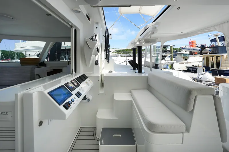 Slide: The Image of Modern Balance 482 yacht cockpit, 2022 model, featuring sleek design and advanced navigation controls. - 14