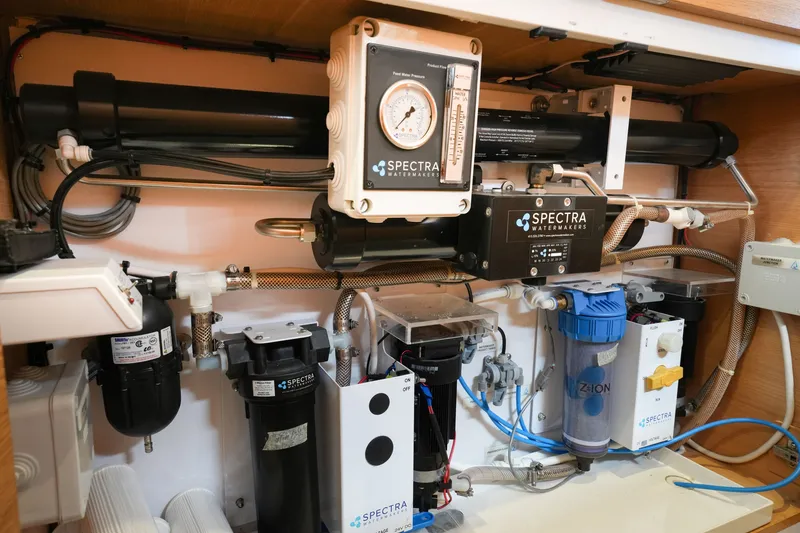 Slide: The Image of Water filtration system in Balance 482, 2022 model, featuring Spectra Watermakers components. - 43