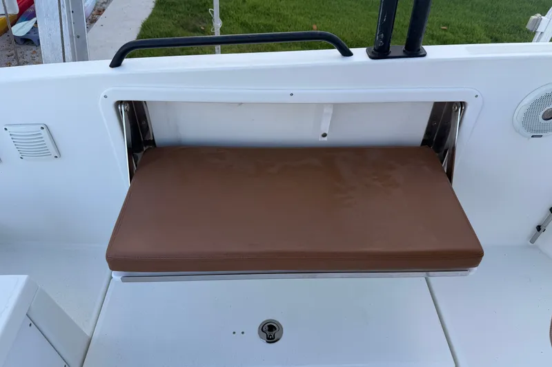 Slide: The Image of Brown cushioned seat on 2019 Beneteau Flyer 7.7 SPACEdeck boat. - 32