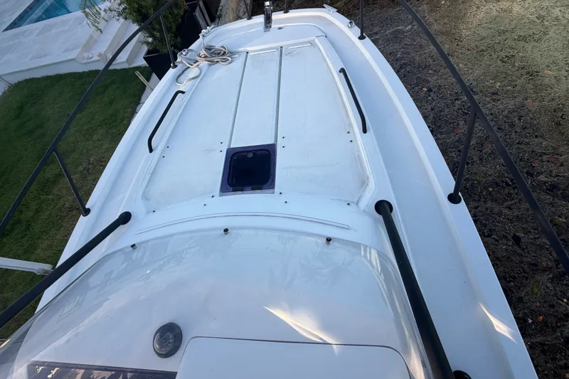 Slide: The Image of 2019 Beneteau Flyer 7.7 SPACEdeck boat deck, featuring sleek design and railing. - 19