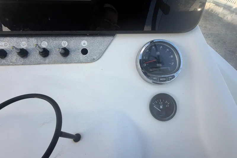 Slide: The Image of Control panel of 2019 Beneteau Flyer 7.7 SPACEdeck with gauges and switches. - 25