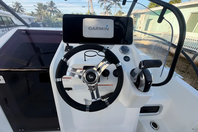 Slide: The Image of Helm of 2019 Beneteau Flyer 7.7 SPACEdeck with Garmin navigation system. - 17