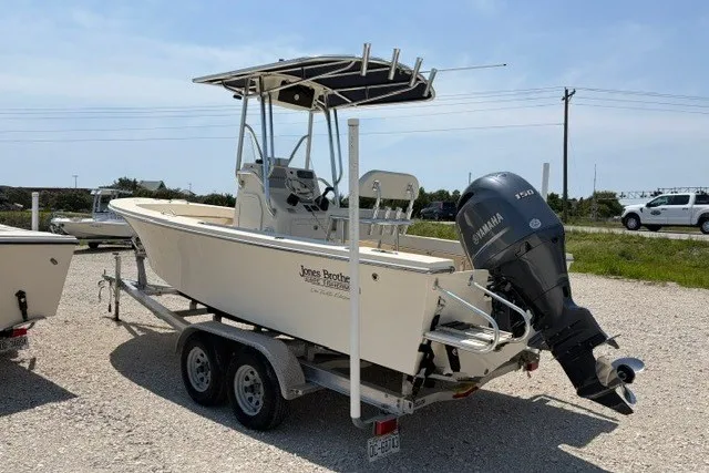 Slide: The Image of 2022 Jones Brothers Cape Fisherman 20 boat on trailer with Yamaha outboard motor. - 2